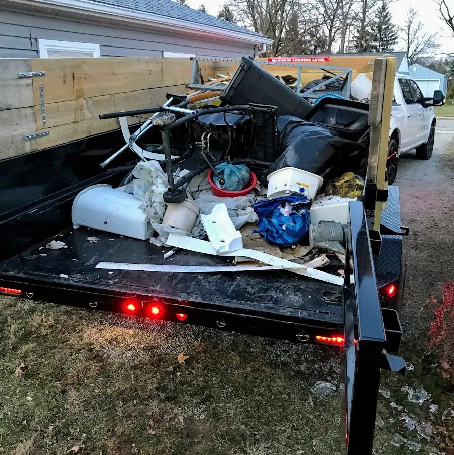 Roll-off dumpster delivered to a residential driveway in Stansbury Park